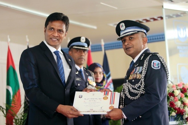 ޖޫން 23، 2015: ޕޮލިސް މެމޯރިއަލް ޑޭ ފާހަަގަކުރުމަށް އިސްކަންދަރު ކޮށީގައި ބޭއްވި ޖަލްސާގެ ތެރެއިން -- ސަން ފޮޓޯ/ފަޔާޒު މޫސާ