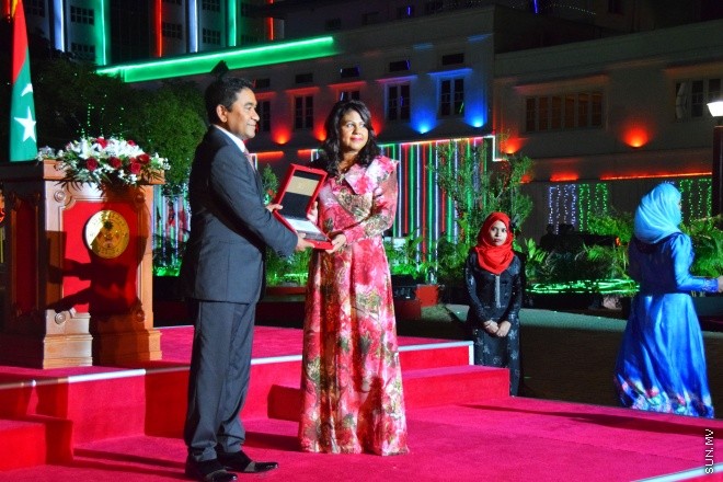 ޖުލައި 26، 2015: މިނިވަންކަމަށް 50 އަހަރު ފުރުމުގެ މުނާސަބާތުގައި، ޖުމހޫރީ މައިދާނުގައި ބޭއްވި، ދިދަ ނެގުމުގެ ހާއްސަ ރަސްމިއްޔާތުގެ ތެރެއިން -- ސަންފޮޓޯ/ ޔޫސުފް ސޮފްވާން