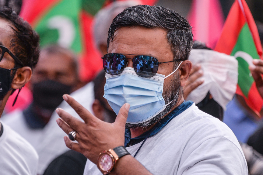 ފެބްރުއަރީ 12، 2021: ކޮވިޑު19ގެ ހާލަތު މާލެ ސަރަހައްދުގައި ގޯސްވެފައިވަނިކޮށް އިދިކޮޅުން ކޯލިޝަނުން "ކޮބާ މަގޭ ފްލެޓު" ނަމުގައި މާލޭގައި ކުރި މުޒާހަރާގެ ތެރެއިން -- ސަން ފޮޓޯ/ ފަޔާޒު މޫސާ 